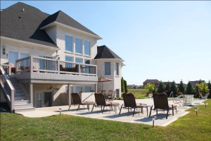 Rear Wooden Balcony and Pool Patio of Custom Luxury Home by Madison Custom Homes Inc. - Central Indiana