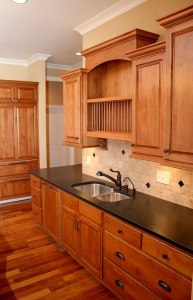 Custom Counters, Hidden Dishwasher, Hand-Built Wood Cabinets Double Sink, Antique Brass Hardware, Tile Backsplash, Hardwood Floors, Luxury Homes, Indianapolis, Central Indiana