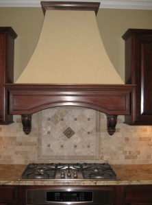 Custom Home Kitchen: Custom Range Hood, Brick Backsplash, Mosaic Tile Backsplash, Granite Countertops, Built-In Stovetop, Indianapolis, Indiana