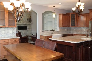 Custom Home Kitchen: Stained Wood Cabinetry, Dining Room Pass-Through, Granite Countertops, Madison Custom Homes Inc., Indianapolis, Indiana