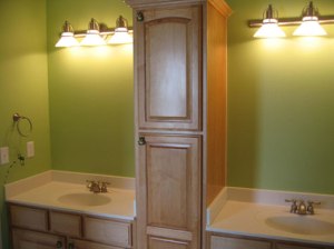Guest Bathroom, Dual Sinks, Storage / Medicine Cabinet Center Column, Wall Sconce Lighting, Luxury Home Builder, Indianapolis, Indiana, Madison Custom Homes Inc.