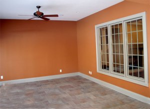 Luxury Home Veranda: Stone Tile Flooring, Ceiling Fan, Bay Windows - Madison Custom Homes, Inc., Indianapolis, Central Indiana