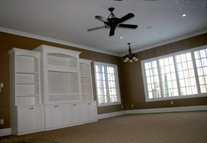 Custom Home Family Room, Hand-Built Bookcase, Ceiling Fan, Large Bay Windows, Recessed Lighting, Indianapolis, Indiana