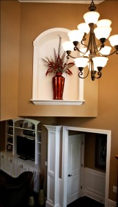 Wrought Iron Chandelier in Foyer, Arched Wall Alcove