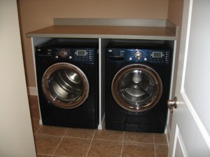 Custom-Built Luxury Home Laundry Room, Large Capacity, Front-Loading Washer and Dryer: Indianapolis, Indiana - Madison Custom Homes Inc.