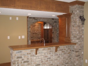 Luxury Home Noblesville: Basement, Custom-Built Wet Bar, Brick Face, Oak Bar Top and Accents - Madison Custom Homes Inc., Indianapolis, Indiana