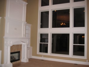 Luxury Home Great Room, Custom-Built Stone Tile Fireplace / Mantel, Built-In Bookcases, Floor-to-Ceiling Windows Carmel, Indiana - Madison Custom Homes